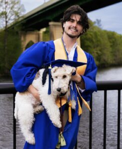 grad with dog